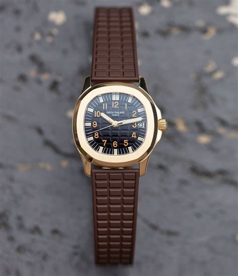 Patek Philippe Aquanaut Yellow gold .